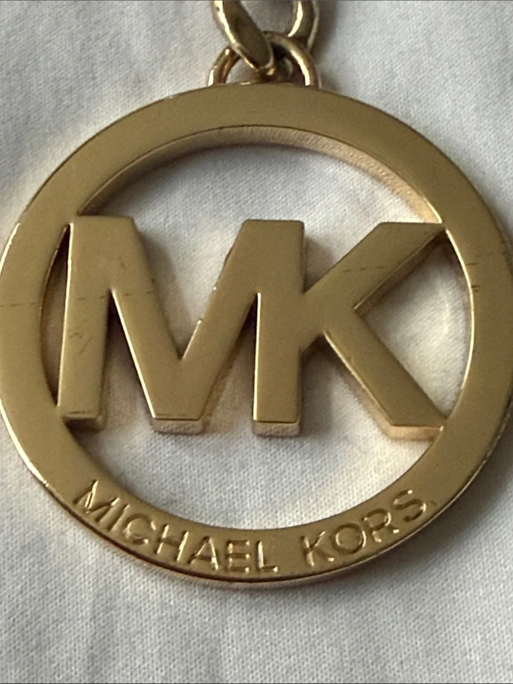 Michael Kors gold tone